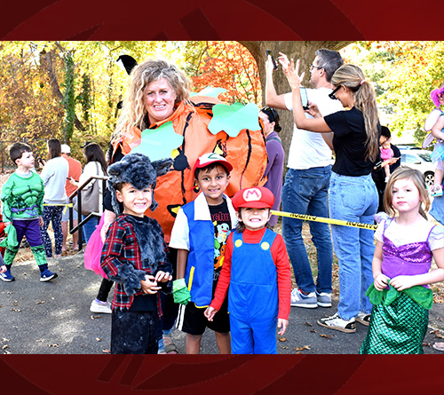 Students Outside Parade Their Halloween Costumes