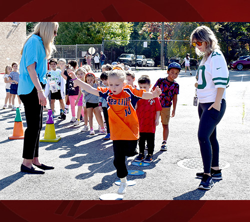 Students Playing Math Outdoor with their teachers