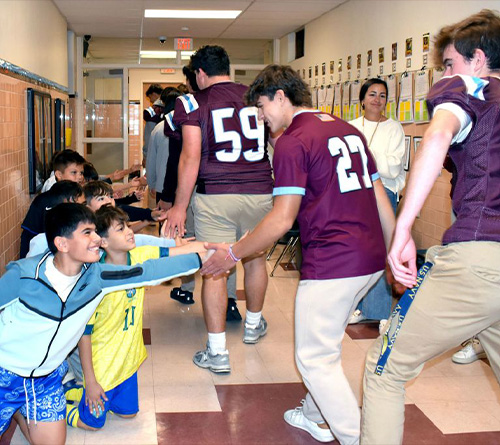 Highschool varsity walks at school