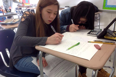 two girls working on a math problem