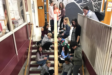 student building a ramp on the stairs